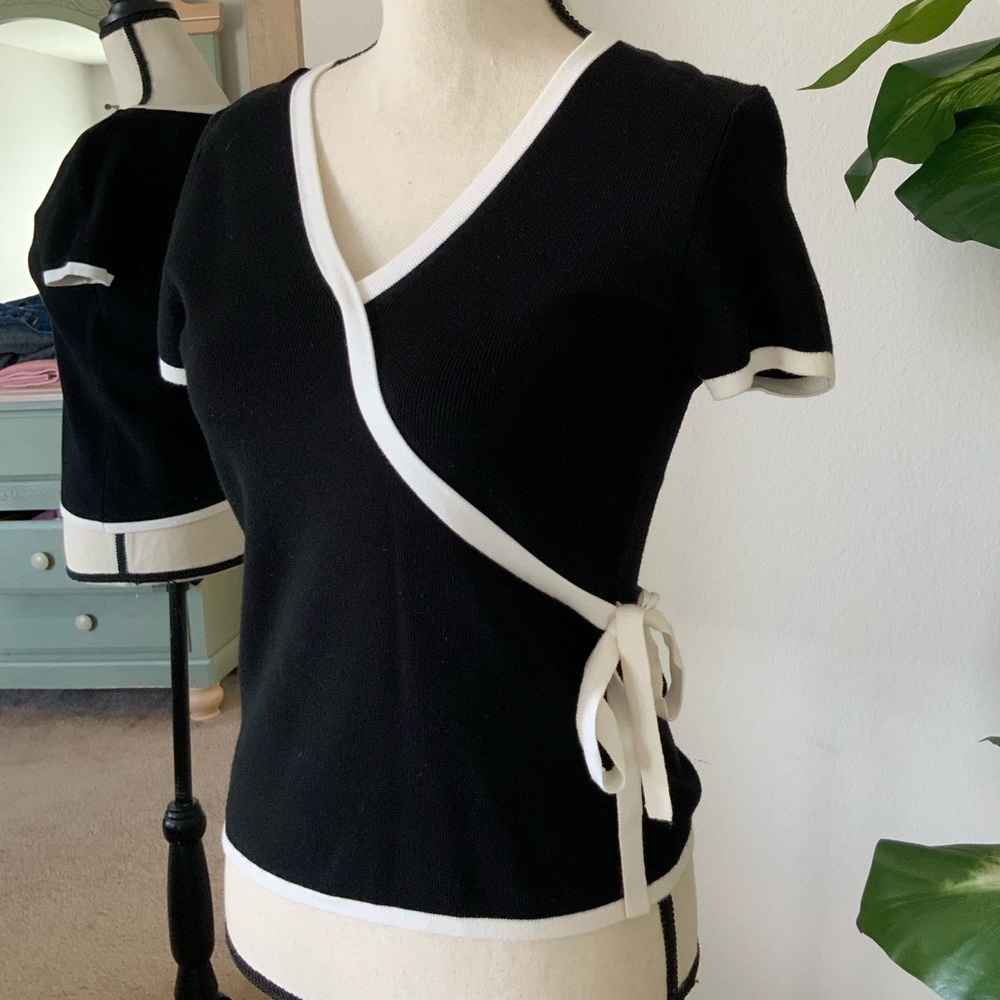 Black and white blouse with a tie